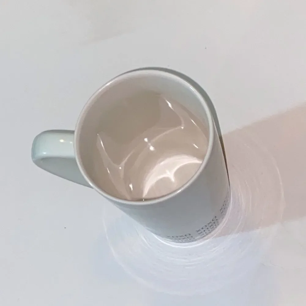 Starbucks White Mug with Green Logo and XOXO Design